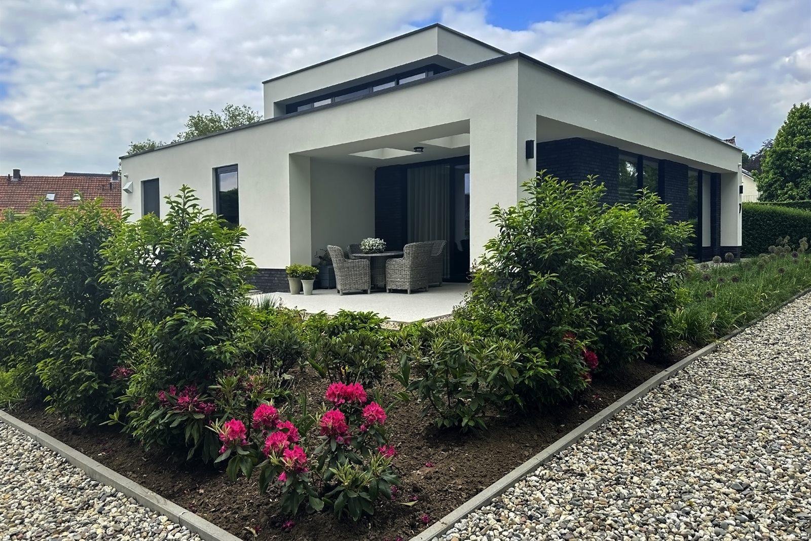 Landscape installation with polished planting and outdoor living details